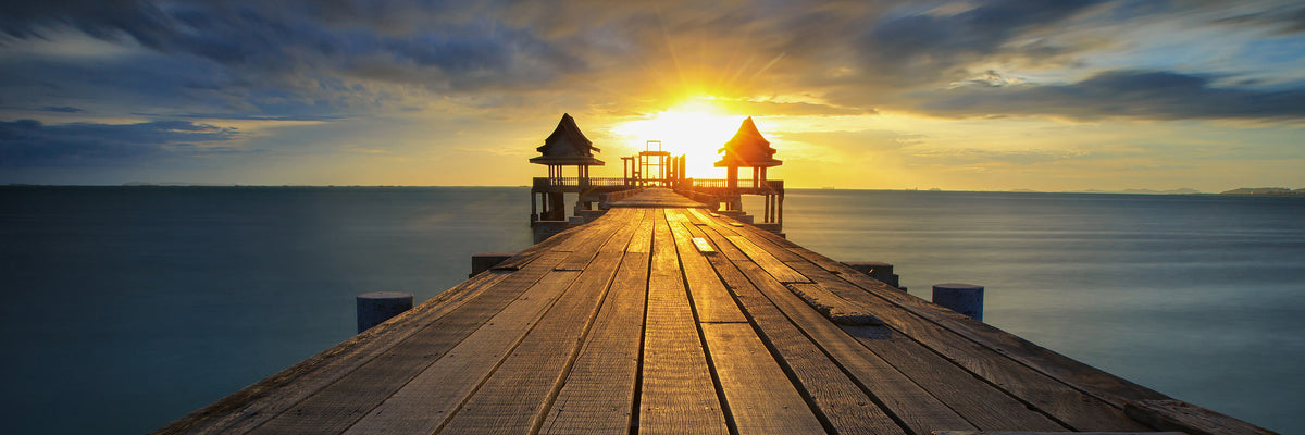 panoramic-canvas-print-sunset-at-the-wooden-bridge-panorama