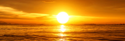 panoramic-canvas-print-glowing-sunset-on-the-water-panorama